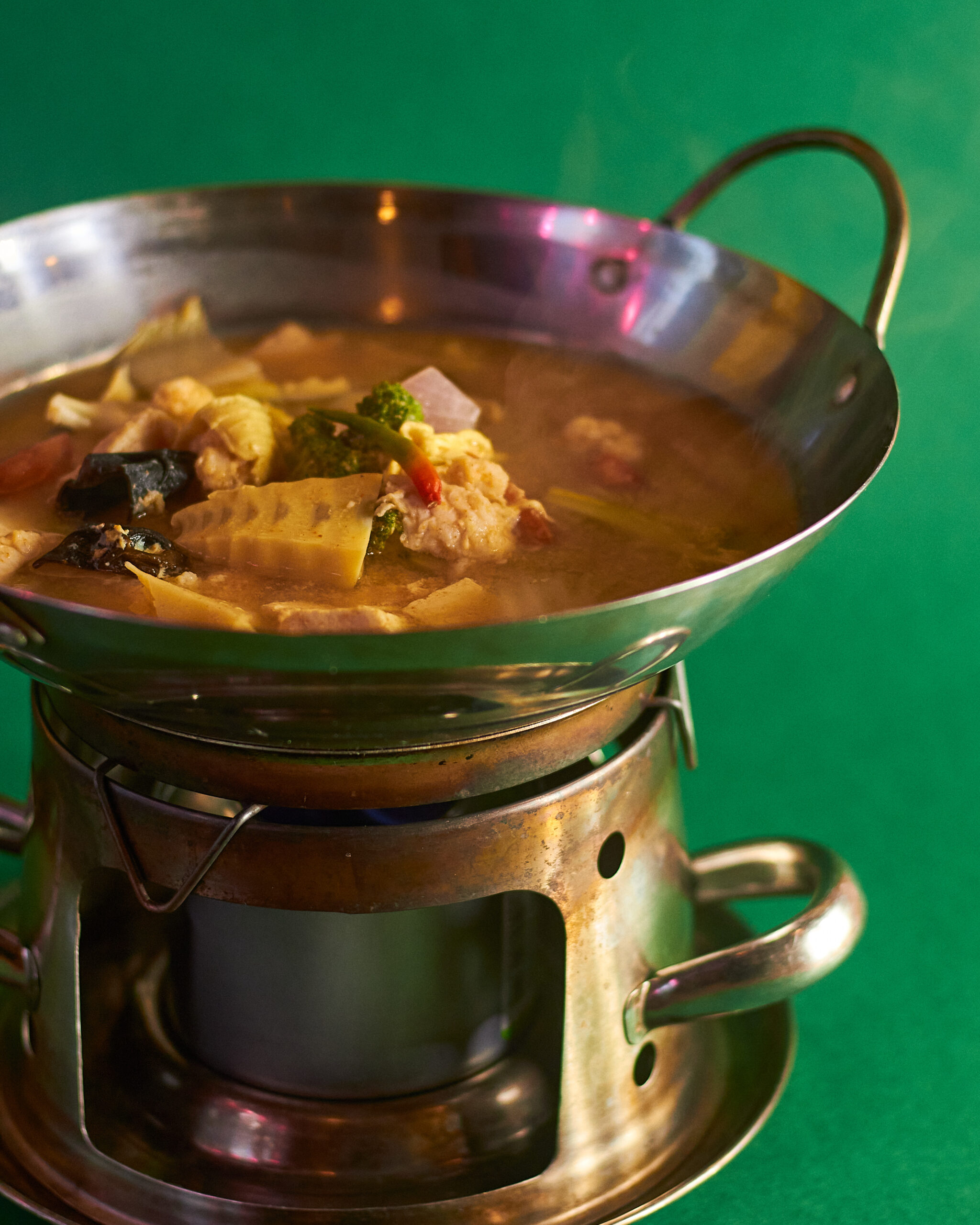 This classic soup tantalizes your taste buds with a balance of savory, spicy, and sour flavors. Tender chicken mingles with crisp vegetables in a vibrant broth, sure to warm you up from within.